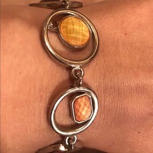 Lia Sophia Silver tone bracelet w/Amber stones.